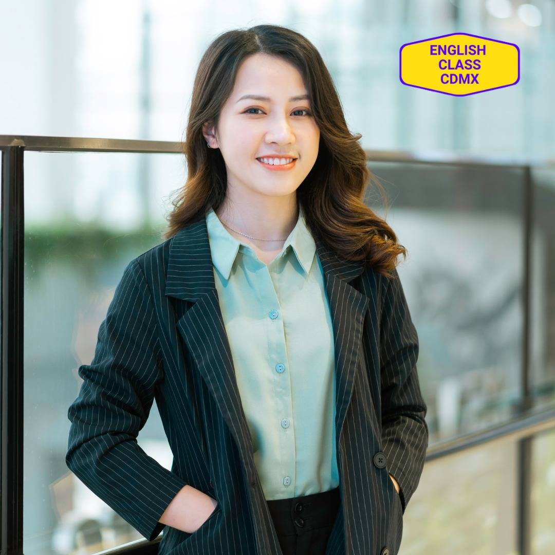 Professional woman in a pinstripe blazer, smiling confidently, ready to improve her speaking skills. Engaging in private English coaching to enhance communication effectiveness and gain confidence in professional interactions.