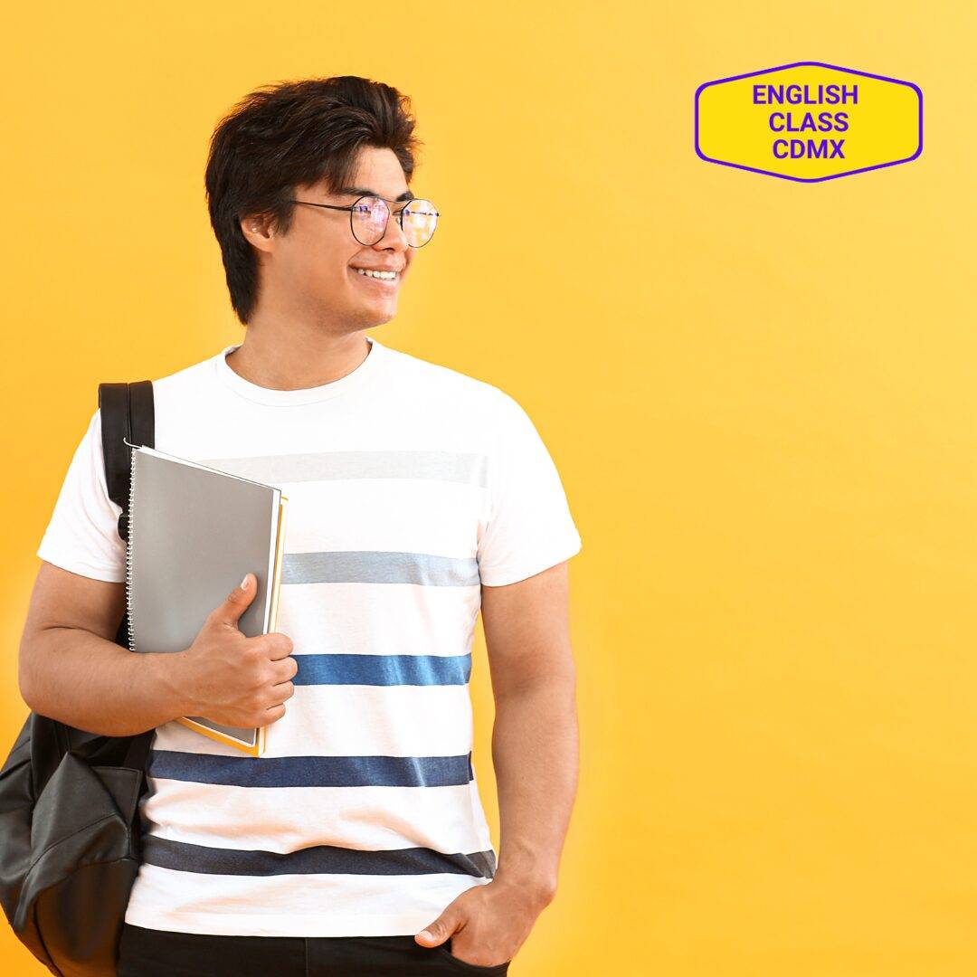 Smiling young student holding notebooks, standing confidently against a yellow background, representing accessible learning resources provided by English Class CDMX.