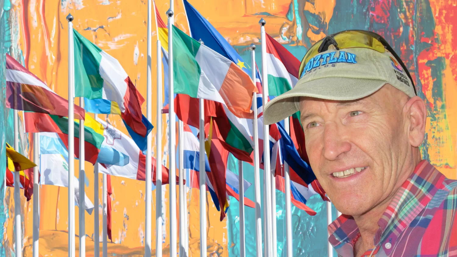 Robert Erickson smiling against a colorful background of international flags, representing personalized English instruction for global success